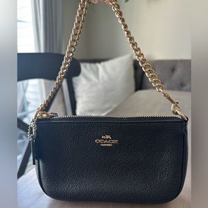 Coach small handbag. Black and gold